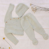 Conjunto de malha verde com bolinhas